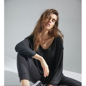 Urban Outfitters out from under black slouchy top